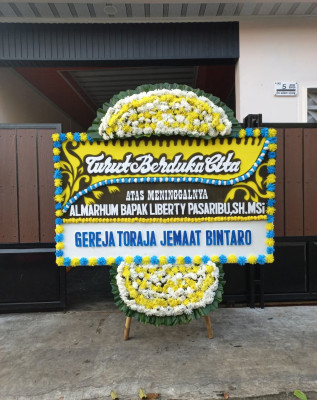 Papan Bunga Duka di Amuma